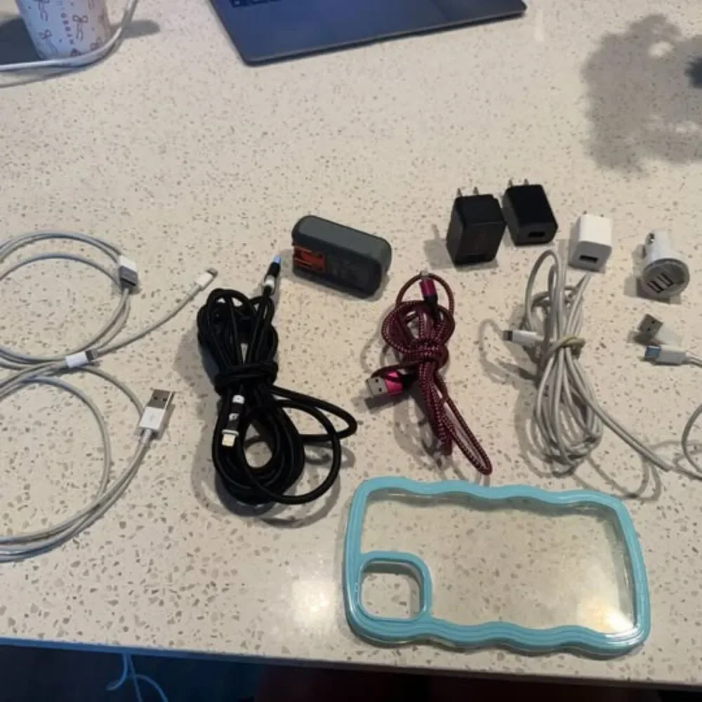 Variety of Android and IPhone Chargers, boxes, IPhone 13 Case